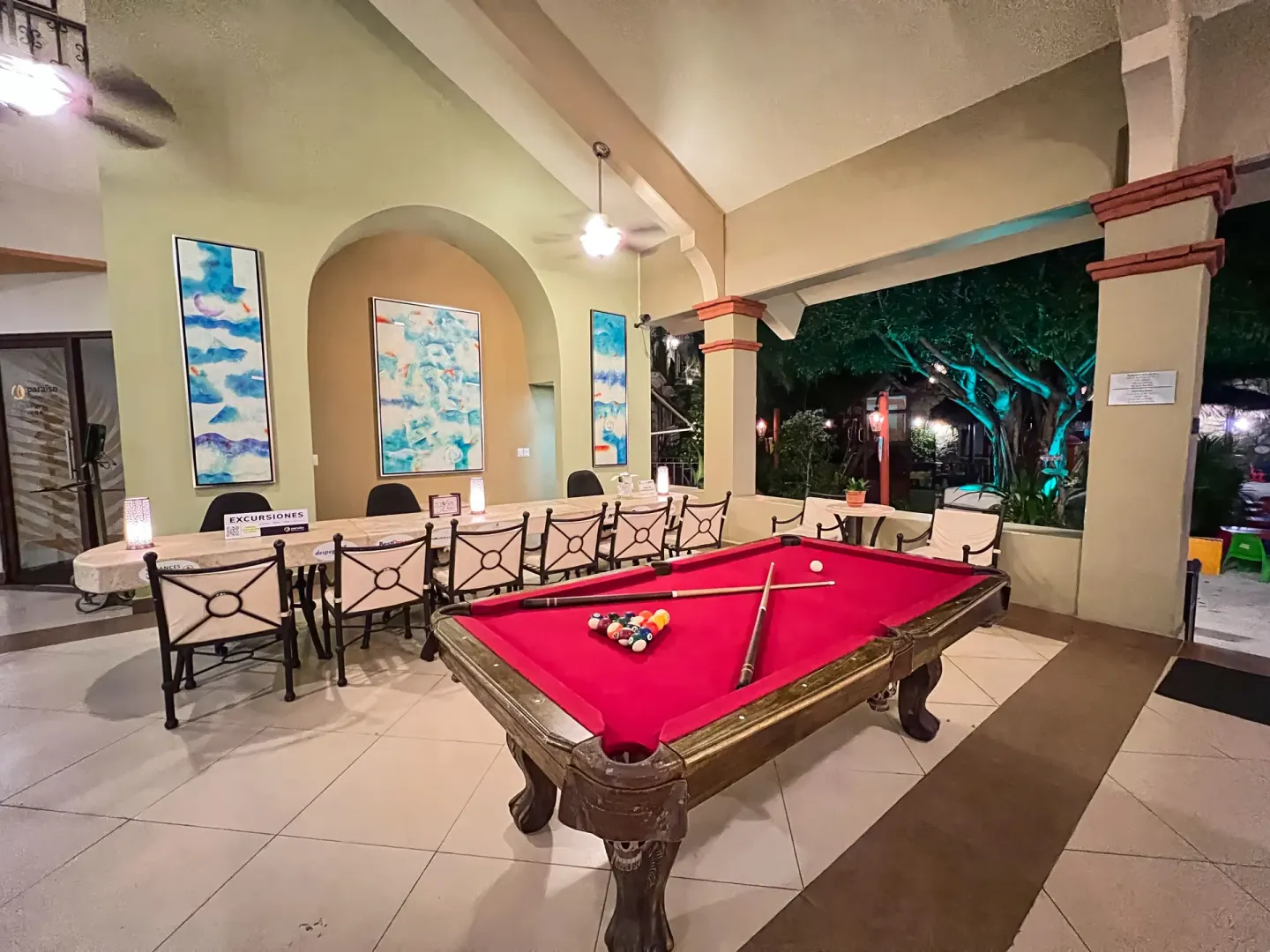 Red-felt pool table in an open-air lounge at Binniguenda Huatulco & Beach Club.