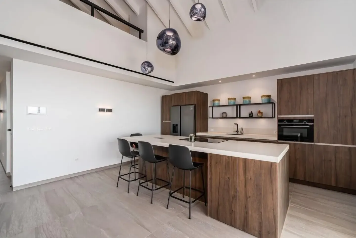 Open kitchen island with bar seating at Blue Bay Curacao Golf & Beach Resort.