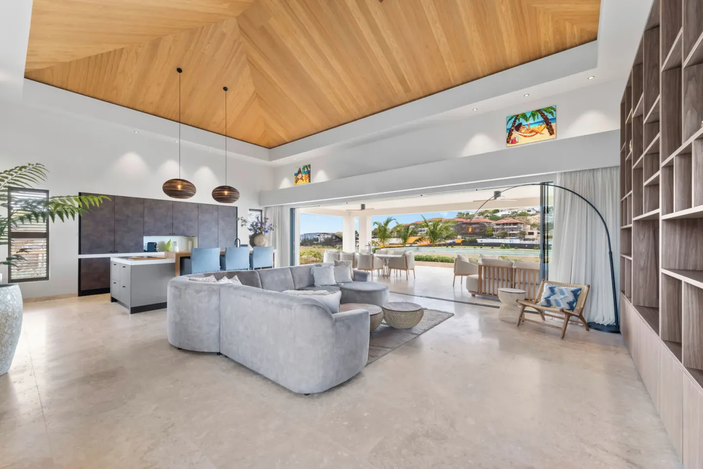 Open-plan living area with terrace doors at Blue Bay Curacao Golf & Beach Resort.