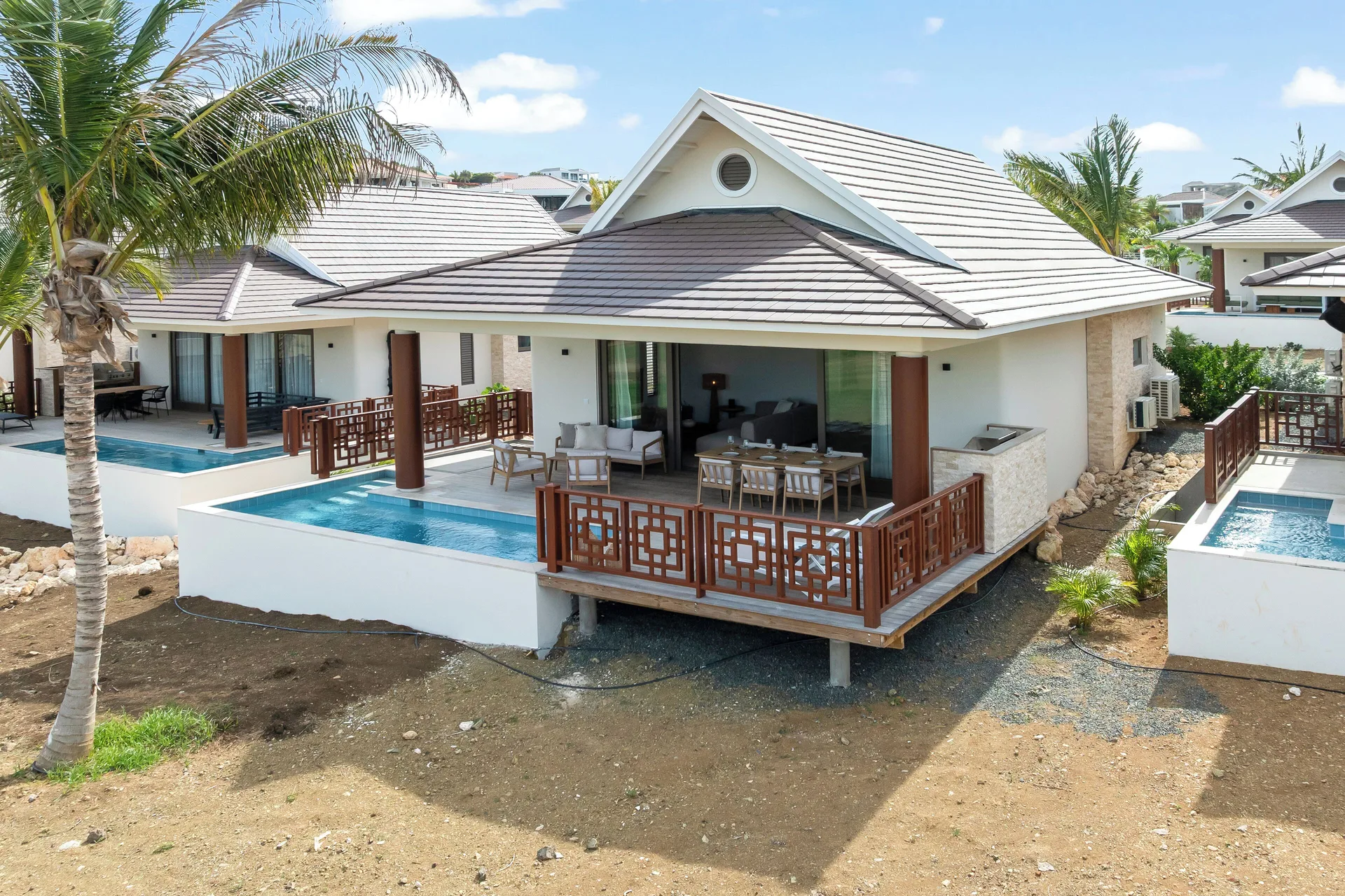 Villa exterior with terrace and plunge pool at Blue Bay Curacao Golf & Beach Resort.