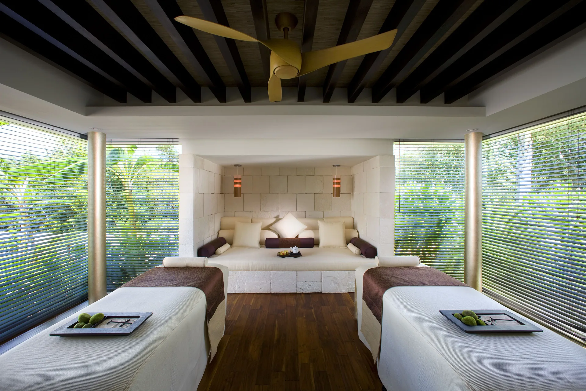 Spa treatment room with two massage beds at Blue Diamond Luxury Boutique.