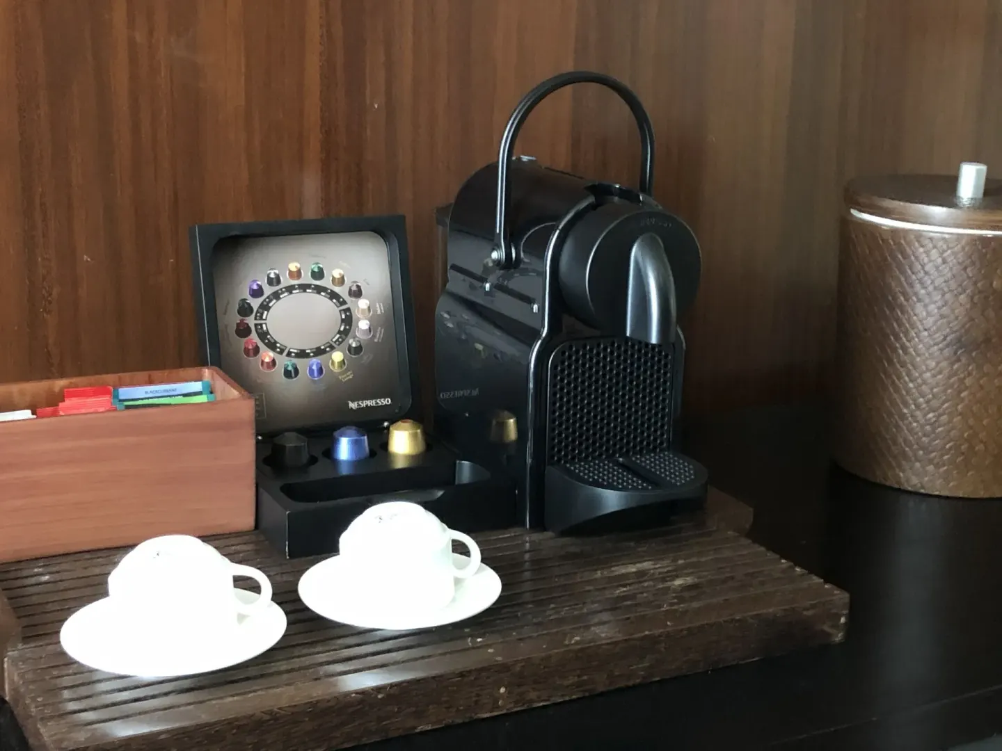 In-room coffee station with cups and capsules at Blue Diamond Luxury Boutique.