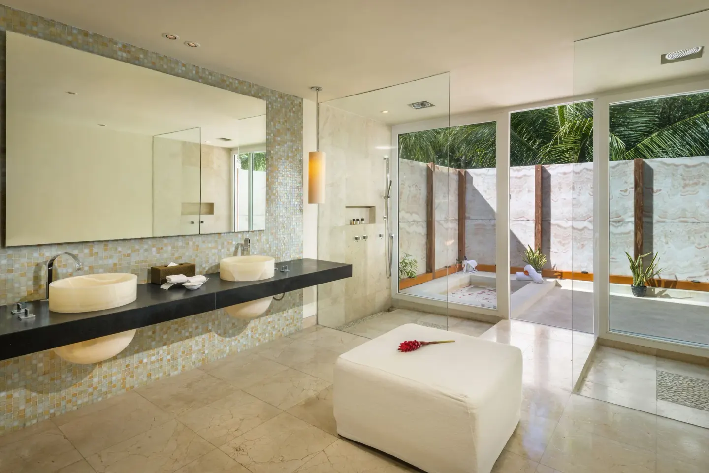 Cenote Lagoon Deluxe Junior Suite bathroom with twin sinks at Blue Diamond Luxury Boutique.
