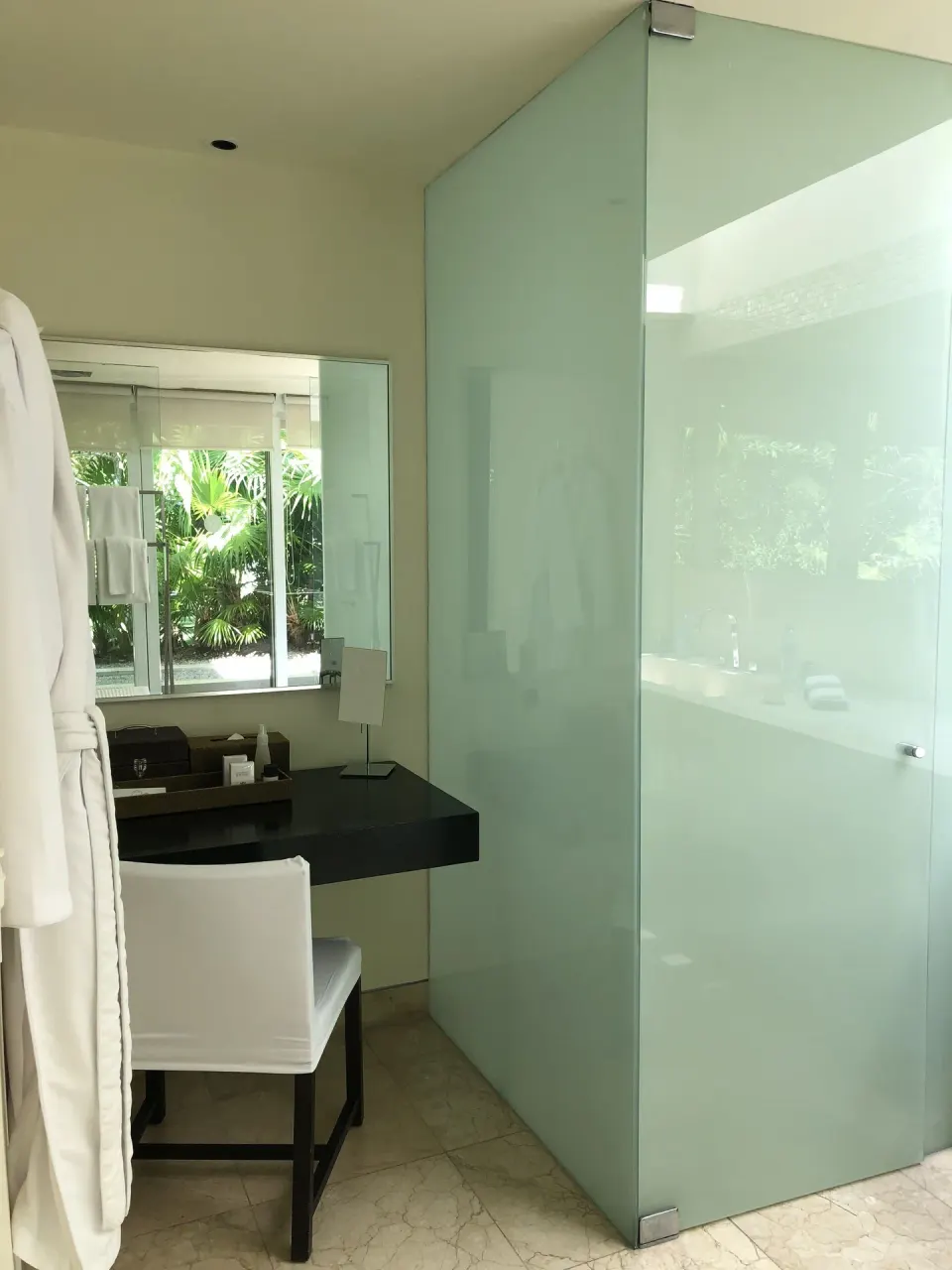 Junior Suite Patio bathroom vanity and frosted glass shower at Blue Diamond Luxury Boutique.