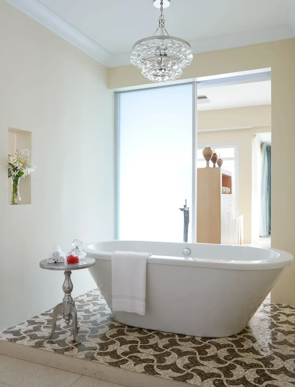 Freestanding bathtub in a bright bathroom at BodyHoliday.
