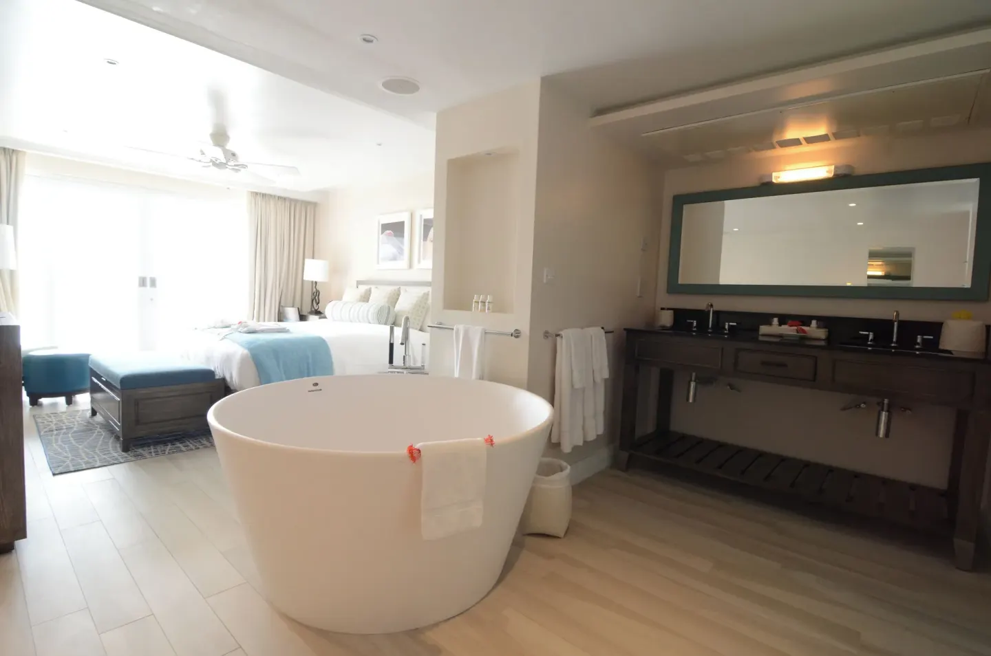 Grand Room Oceanfront soaking tub and double vanity beside the bed at BodyHoliday.