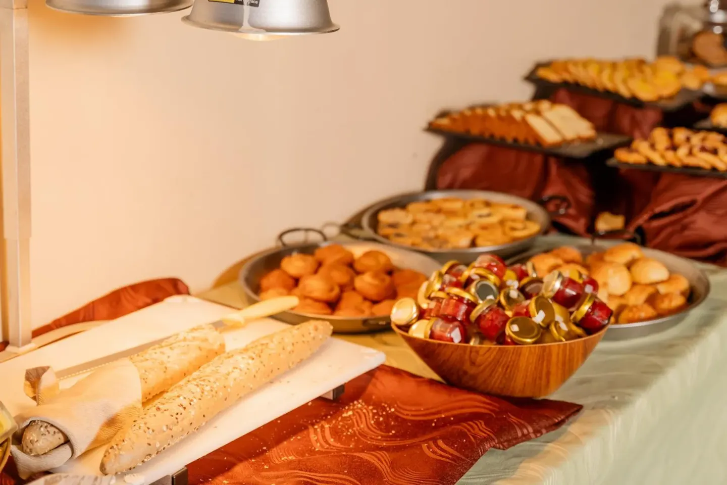 Breakfast buffet pastries, breads, and preserves at Borinquen Thermal Resort.