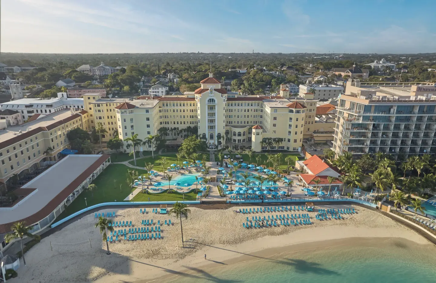 Daytime aerial view of pool, beach and resort buildings at British Colonial Nassau.