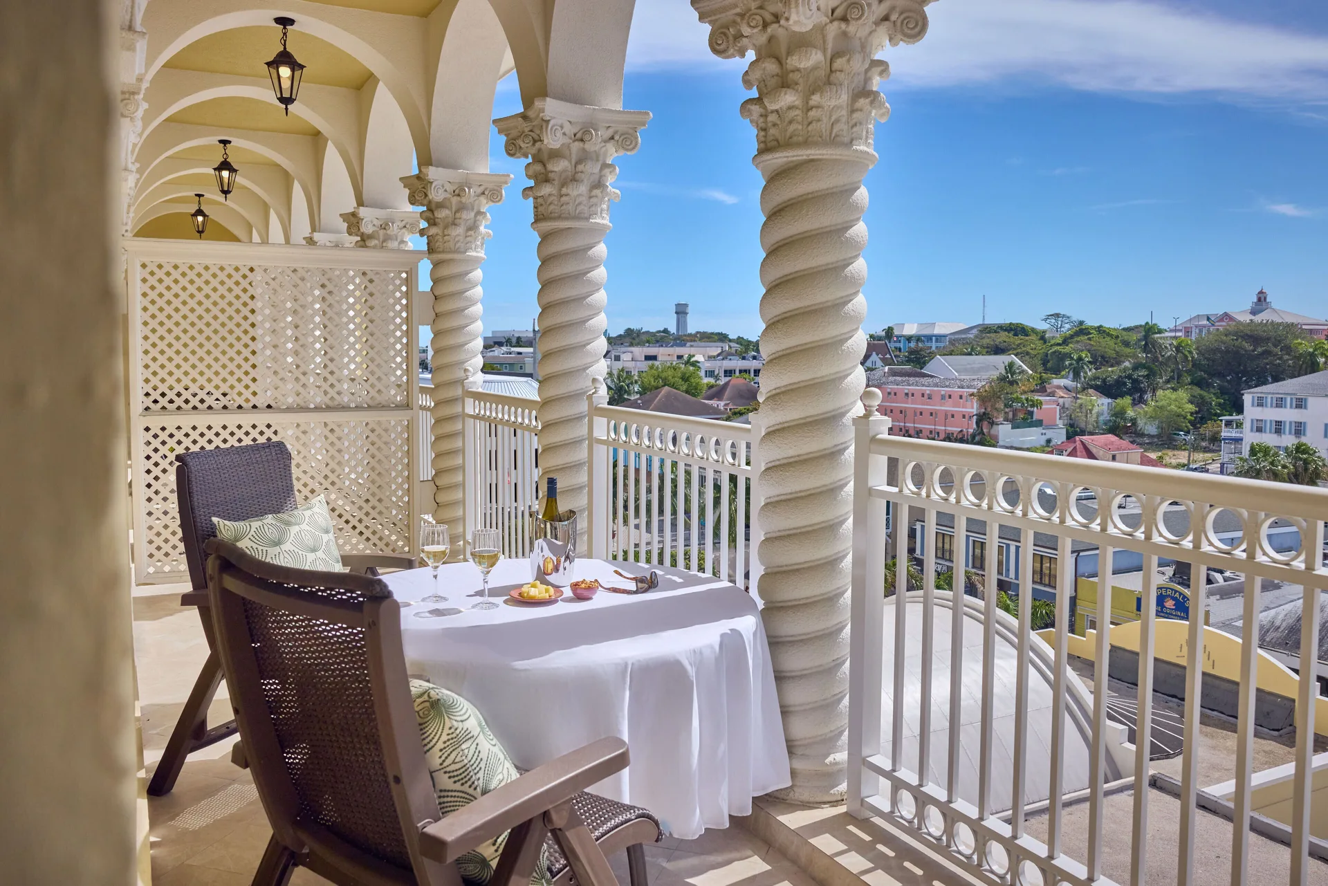 Furnished arched balcony overlooking Nassau at British Colonial Nassau.