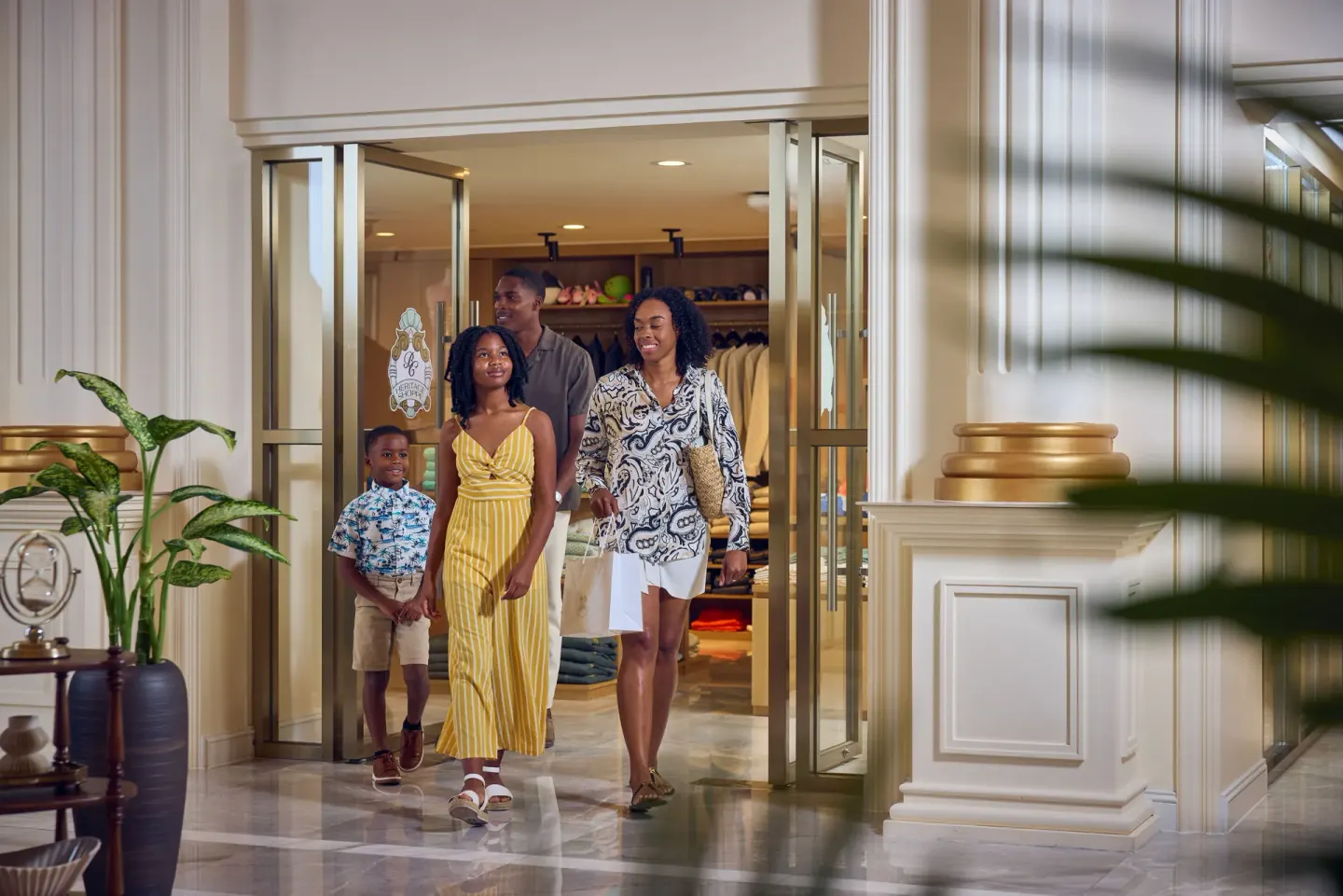Family walking from a boutique area inside British Colonial Nassau.