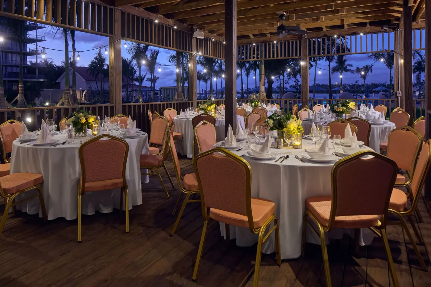 Outdoor event pavilion set with banquet tables at British Colonial Nassau.