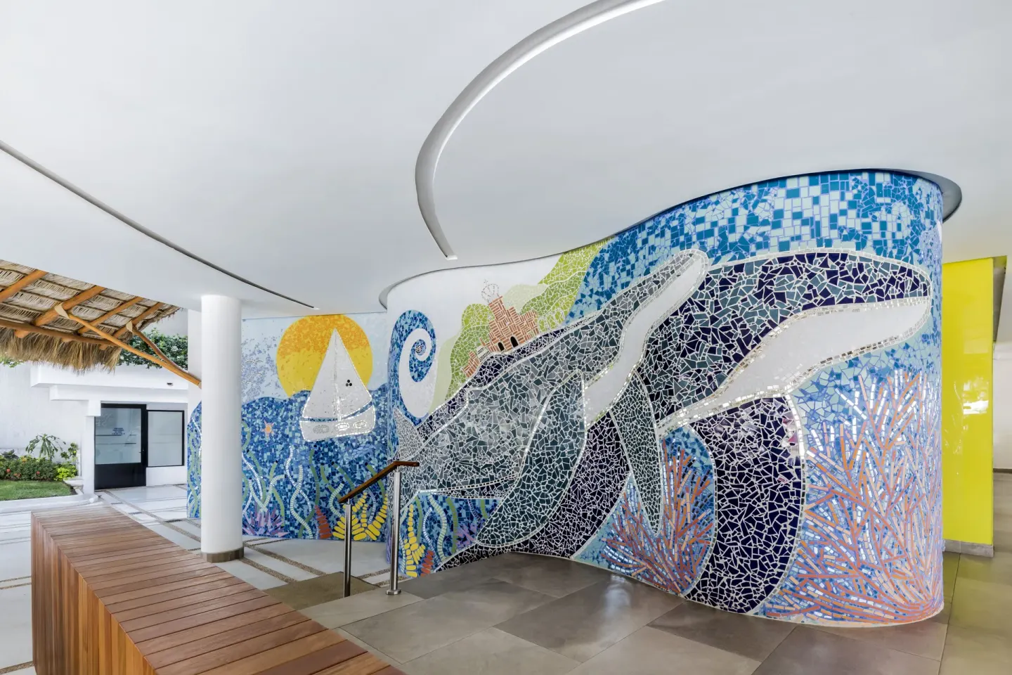 Whale mosaic wall and covered walkway at Buenaventura Grand Hotel & Great Moments.
