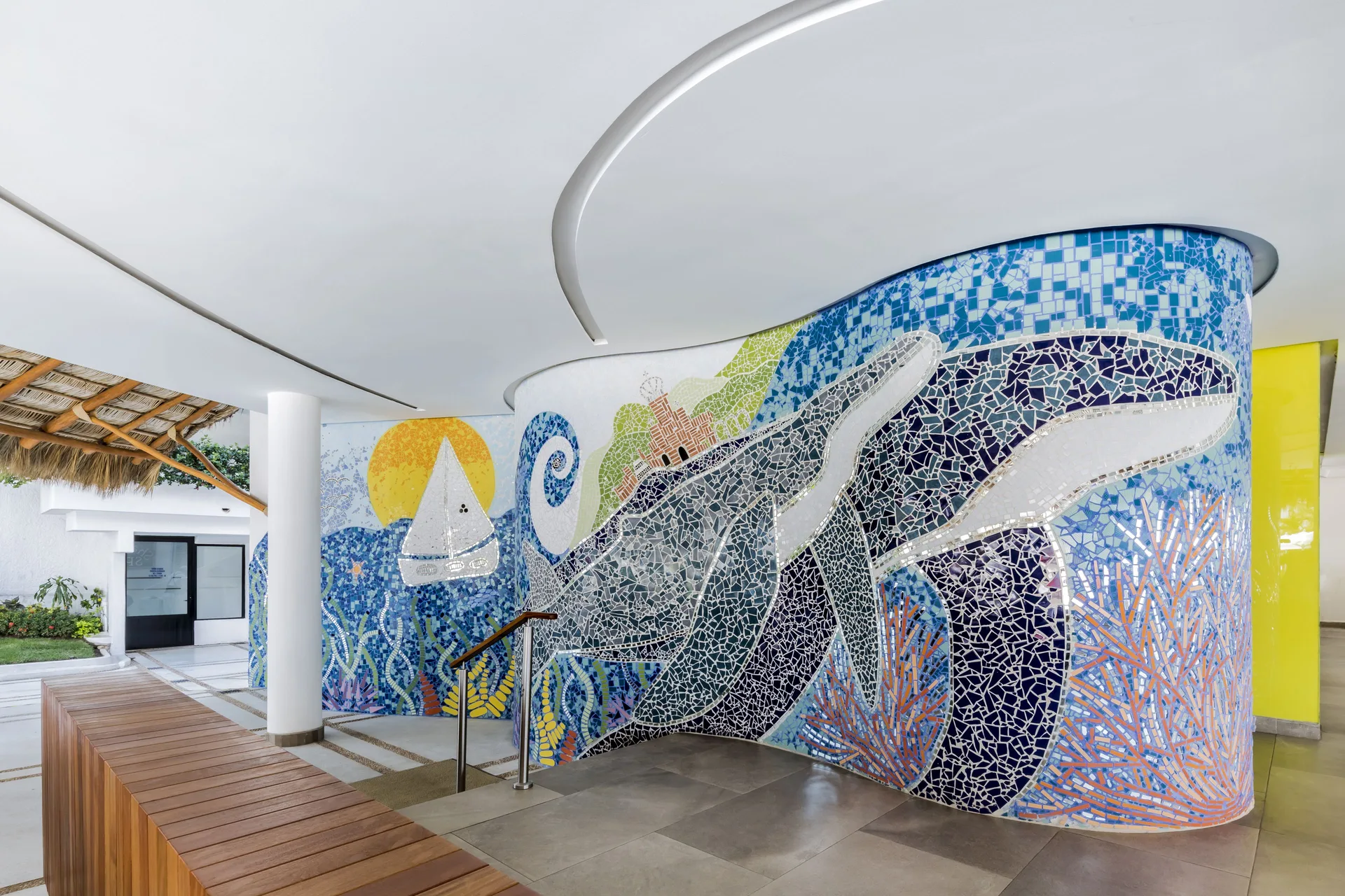 Whale mosaic wall and covered walkway at Buenaventura Grand Hotel & Great Moments.