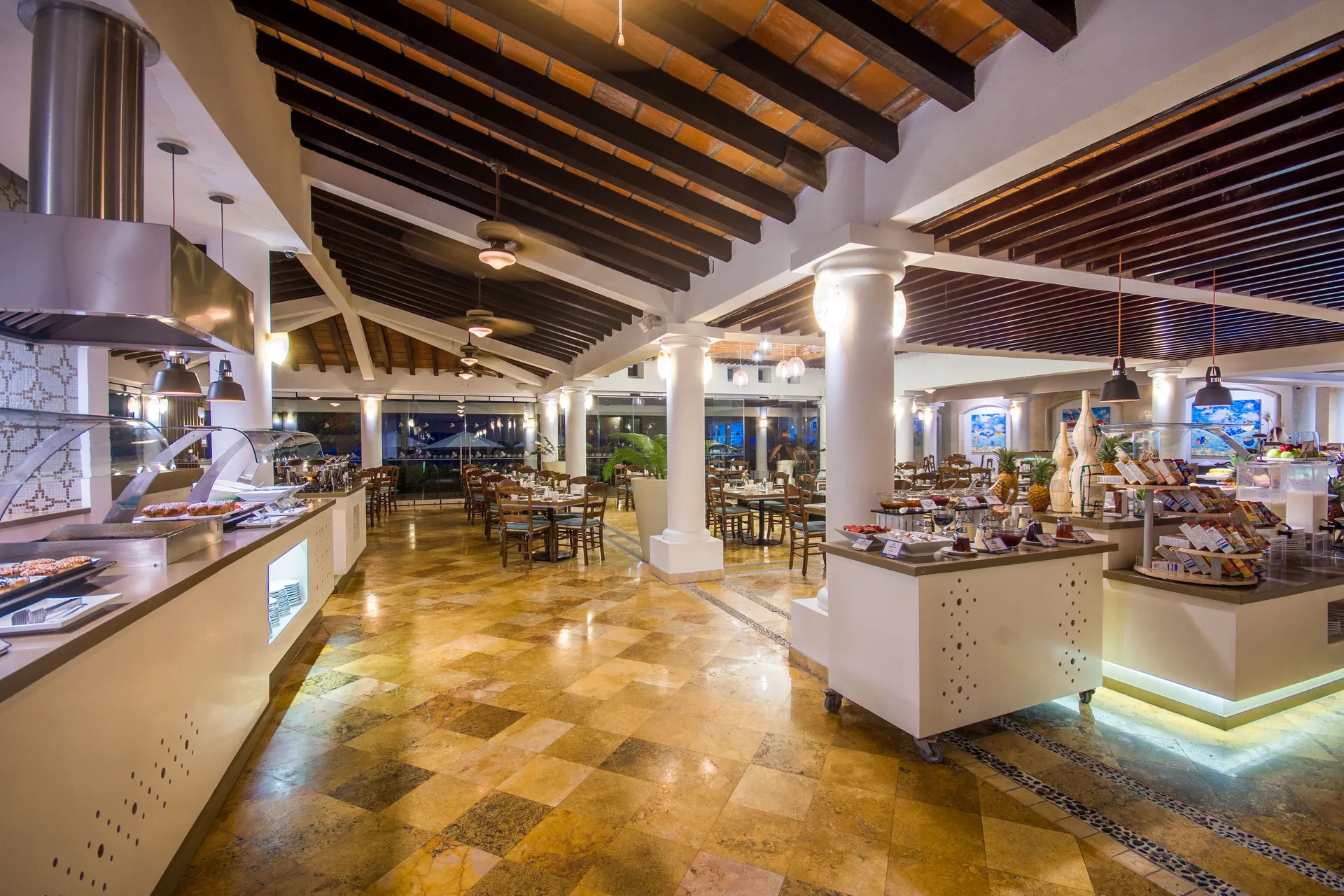 Buffet dining room with food stations at Buenaventura Grand Hotel & Great Moments.