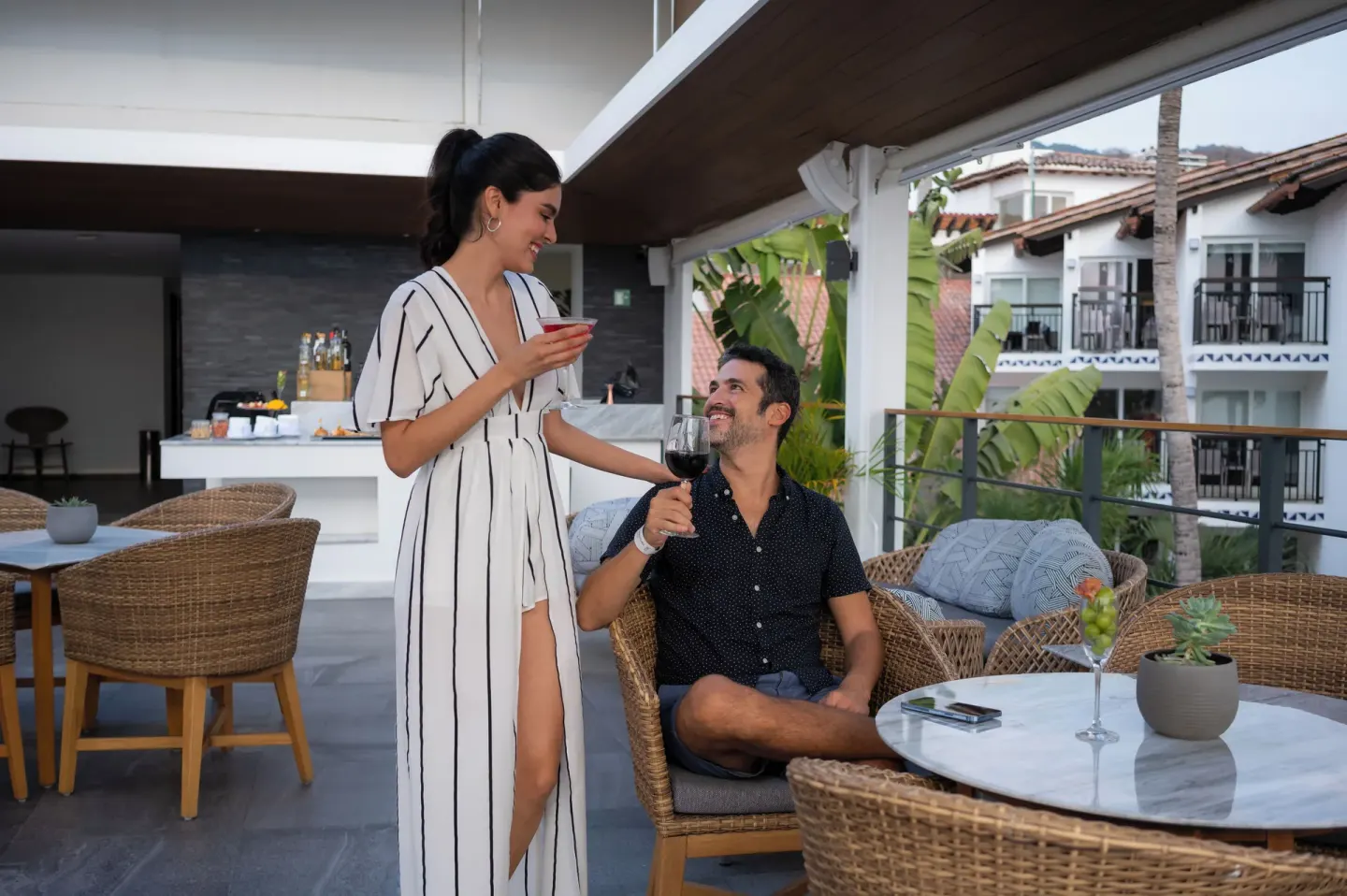 Terrace bar lounge with wicker seating at Buenaventura Grand Hotel & Great Moments.