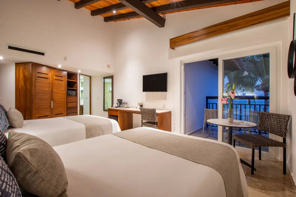 Deluxe Ocean View two-bed room with balcony at Buenaventura Grand Hotel & Great Moments.