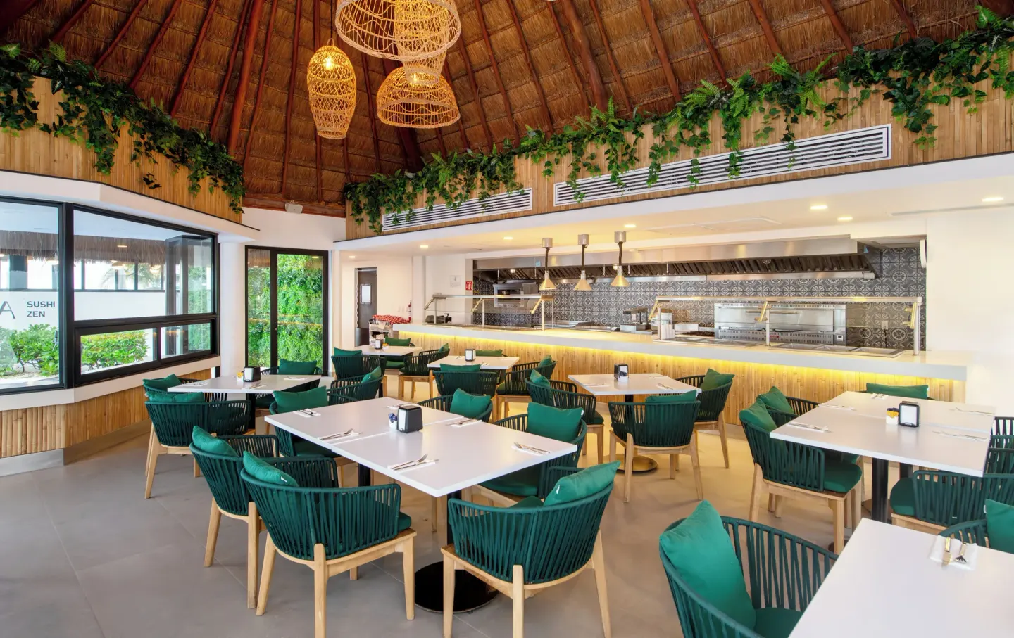 La Vista Sushi Zen dining room with thatched ceiling and open kitchen at Cancun Bay Hotel.