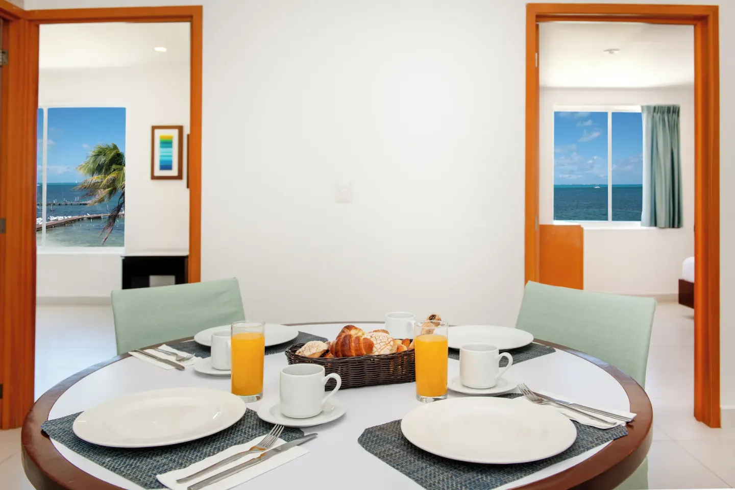 Master Suite 3 Bedrooms breakfast table between ocean-view bedrooms at Cancun Bay Hotel.