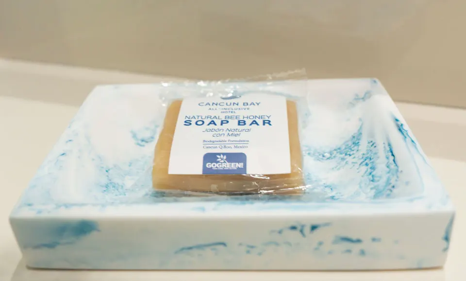 Standard Room soap bar at Cancun Bay Hotel on a blue-and-white tray in the bathroom.