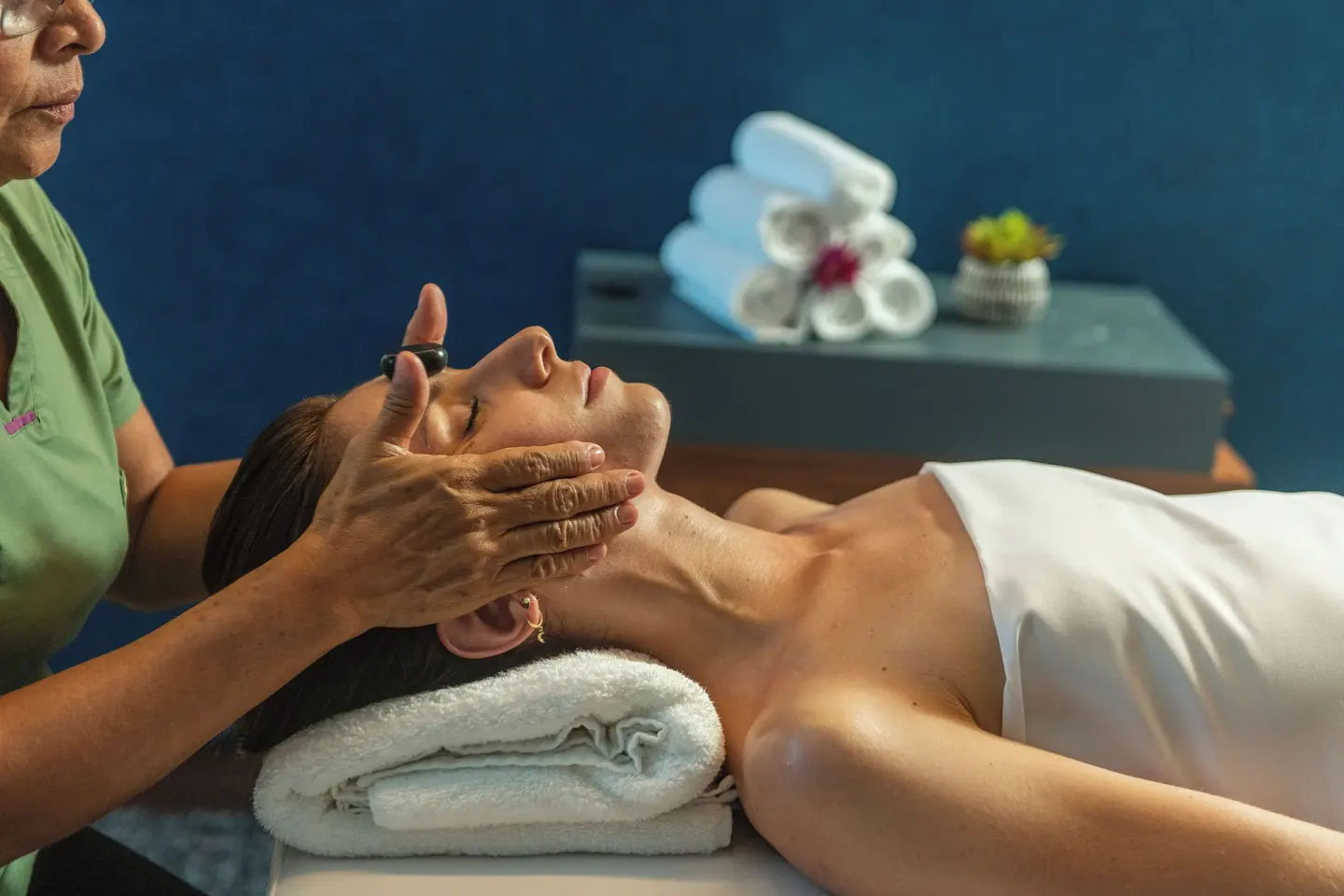 Facial massage treatment in the spa at Canopy by Hilton Cancun La Isla.