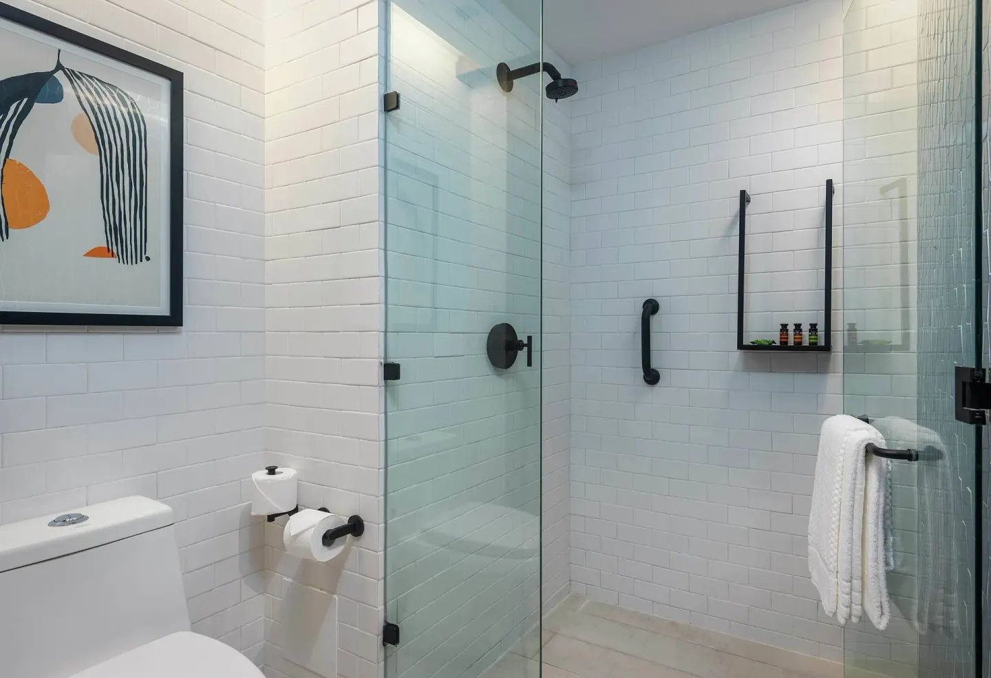 La Isla One Bed Room bathroom with glass shower at Canopy by Hilton Cancun La Isla.