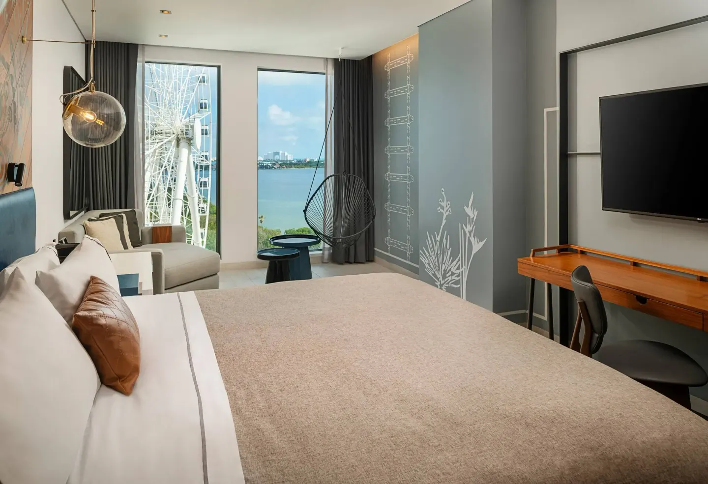 La Isla One Bed Room with king bed and lagoon-facing windows at Canopy by Hilton Cancun La Isla.