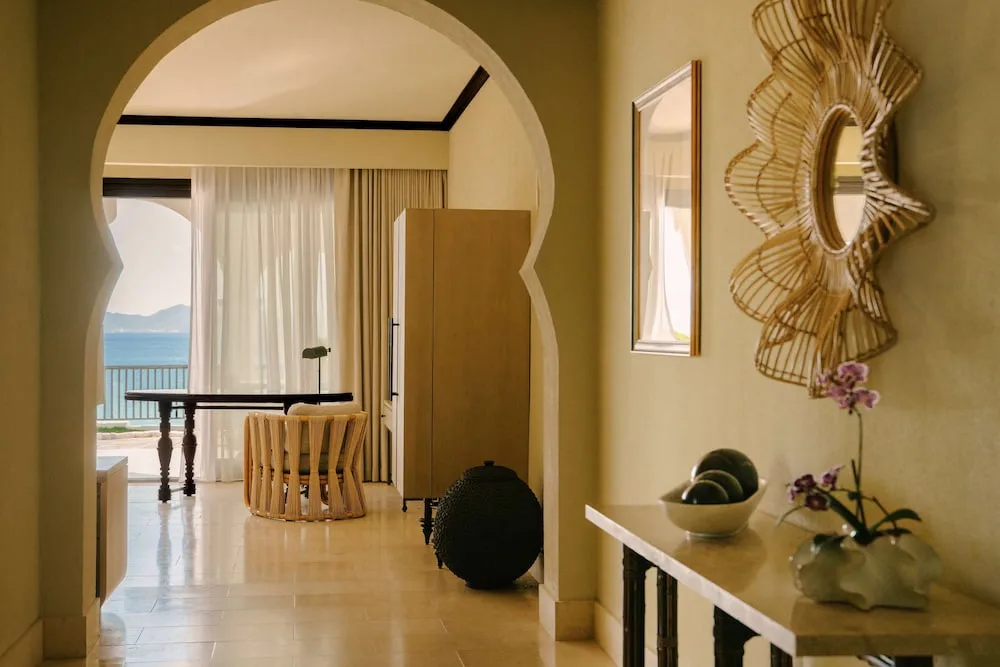 Arched guest room entry with sea-facing balcony at Cap Juluca, Anguilla.
