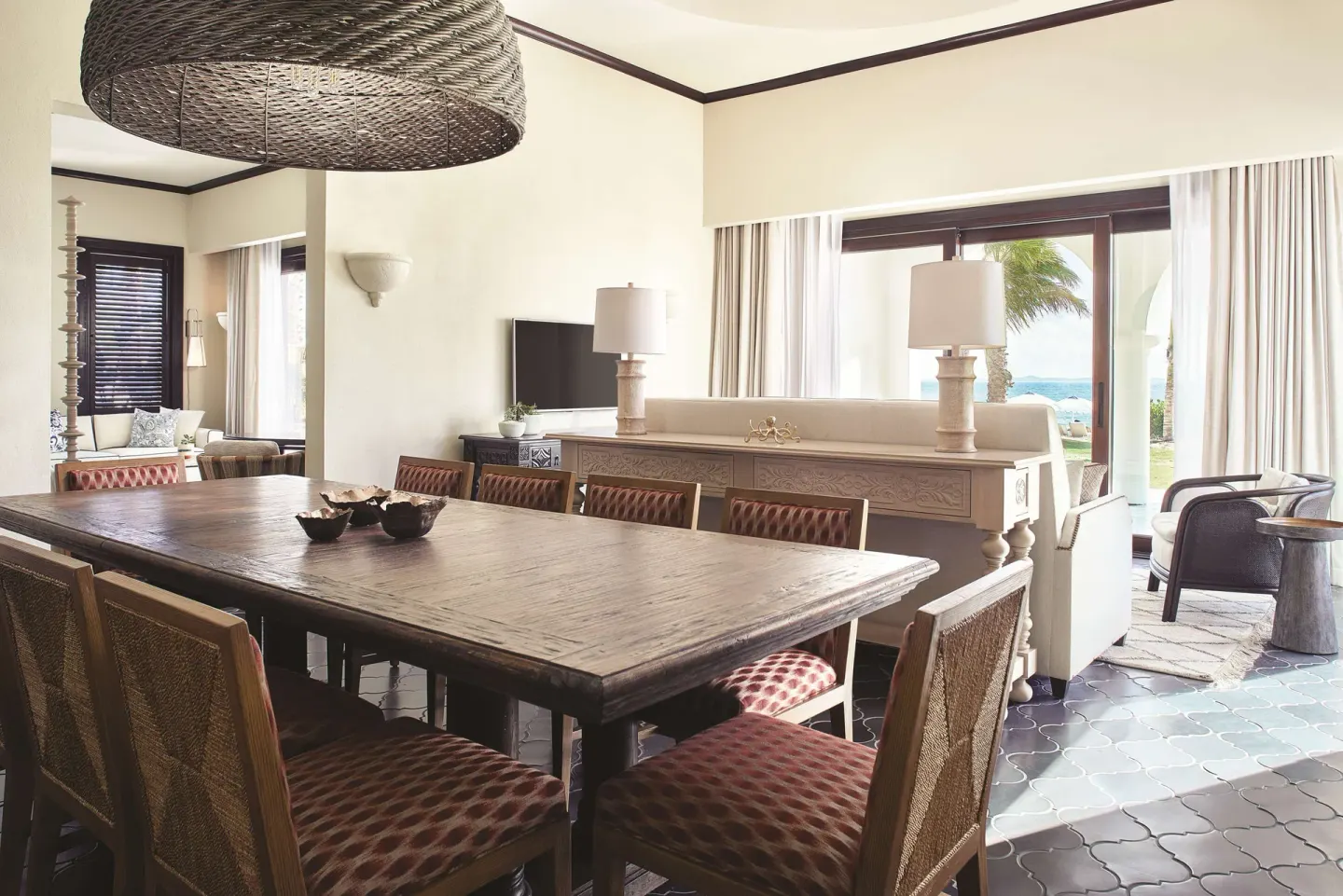 Dining and living room in a beachfront plunge pool casita suite at Cap Juluca, Anguilla.