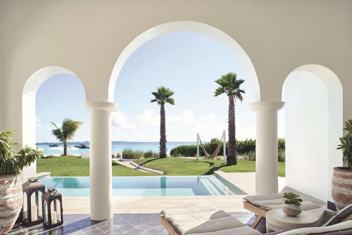Covered terrace and plunge pool of a beachfront casita suite at Cap Juluca, Anguilla, facing the sea.