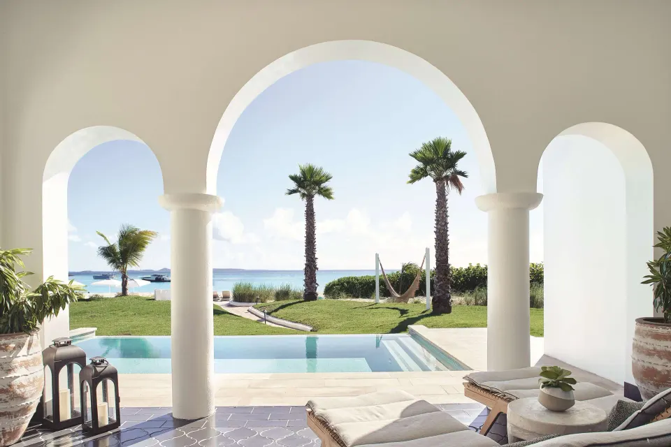 Covered terrace and plunge pool of a beachfront casita suite at Cap Juluca, Anguilla, facing the sea.