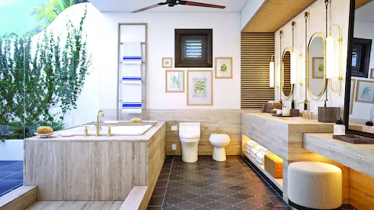 Open marble bathroom in a Deluxe Room, Beachfront at Cap Juluca, Anguilla, with tub and double vanity.