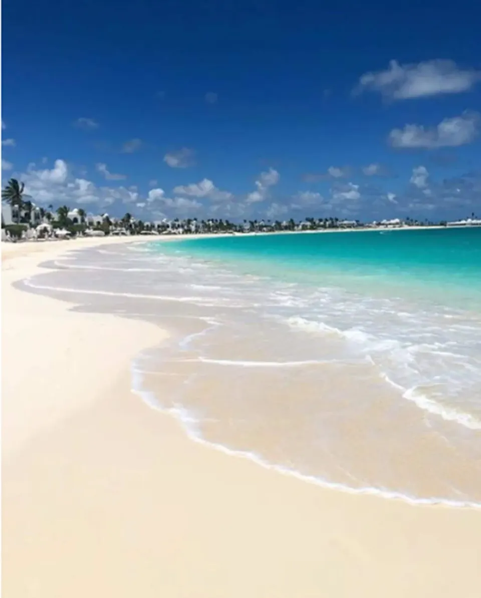 White sand and turquoise water along the beachfront at Cap Juluca, Anguilla.