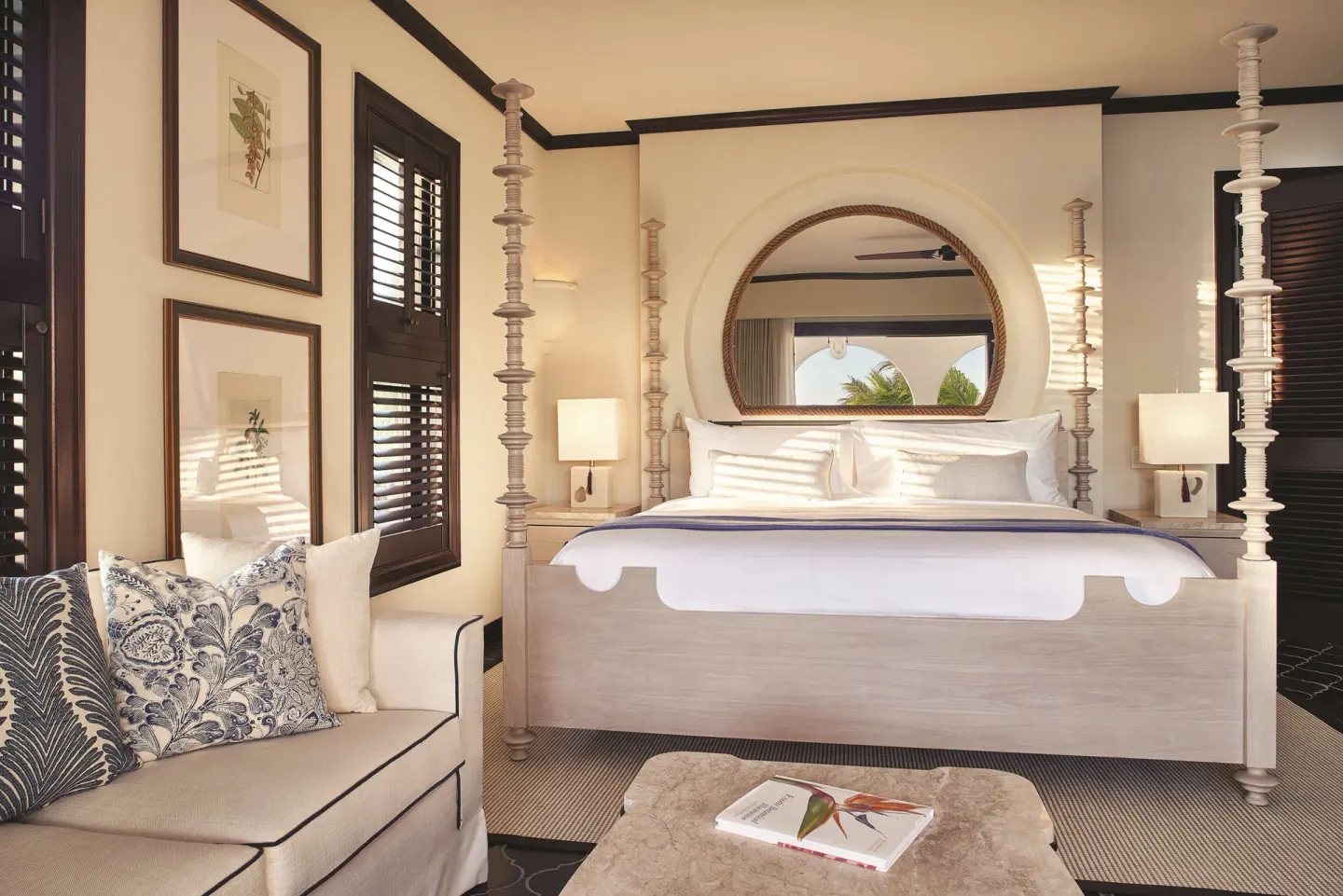 Deluxe Room Beachfront king bed and sofa at Cap Juluca, Anguilla.