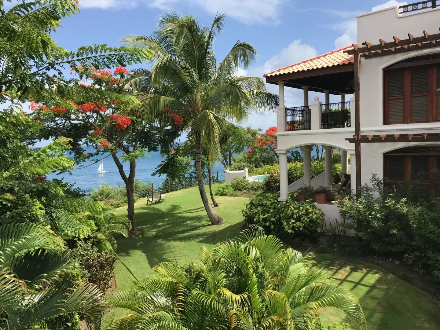 Garden and sea view near a Garden View Room at Cap Maison Resort & Spa.