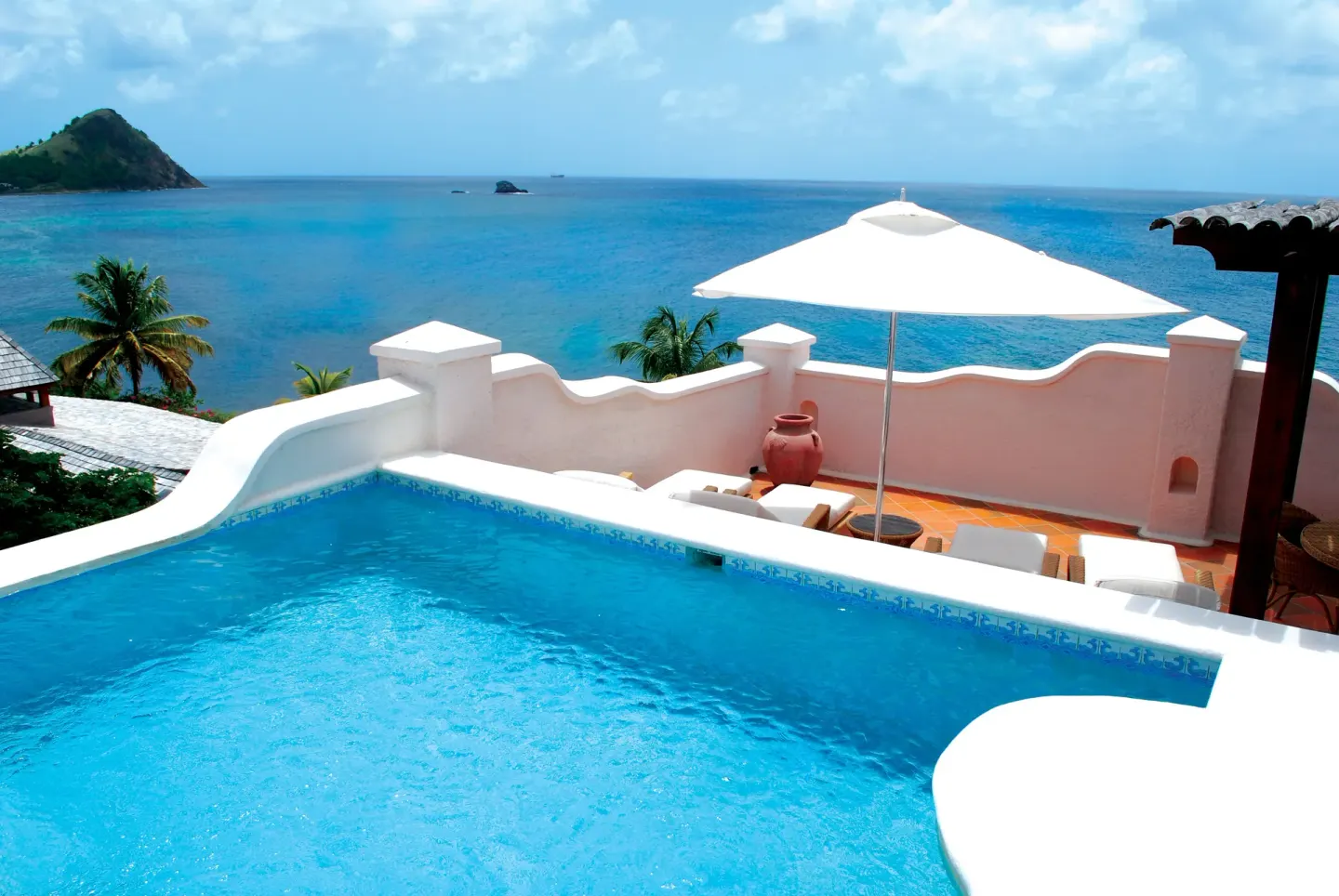 Private pool and roof terrace overlooking the ocean at Cap Maison Resort & Spa.