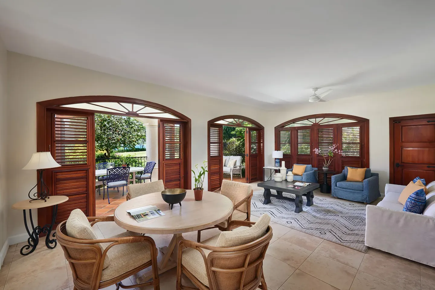 Living and dining area in a Spanish Courtyard suite at Cap Maison Resort & Spa.