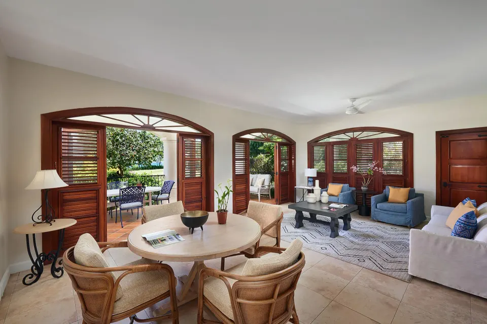 Living and dining area in a Spanish Courtyard suite at Cap Maison Resort & Spa.