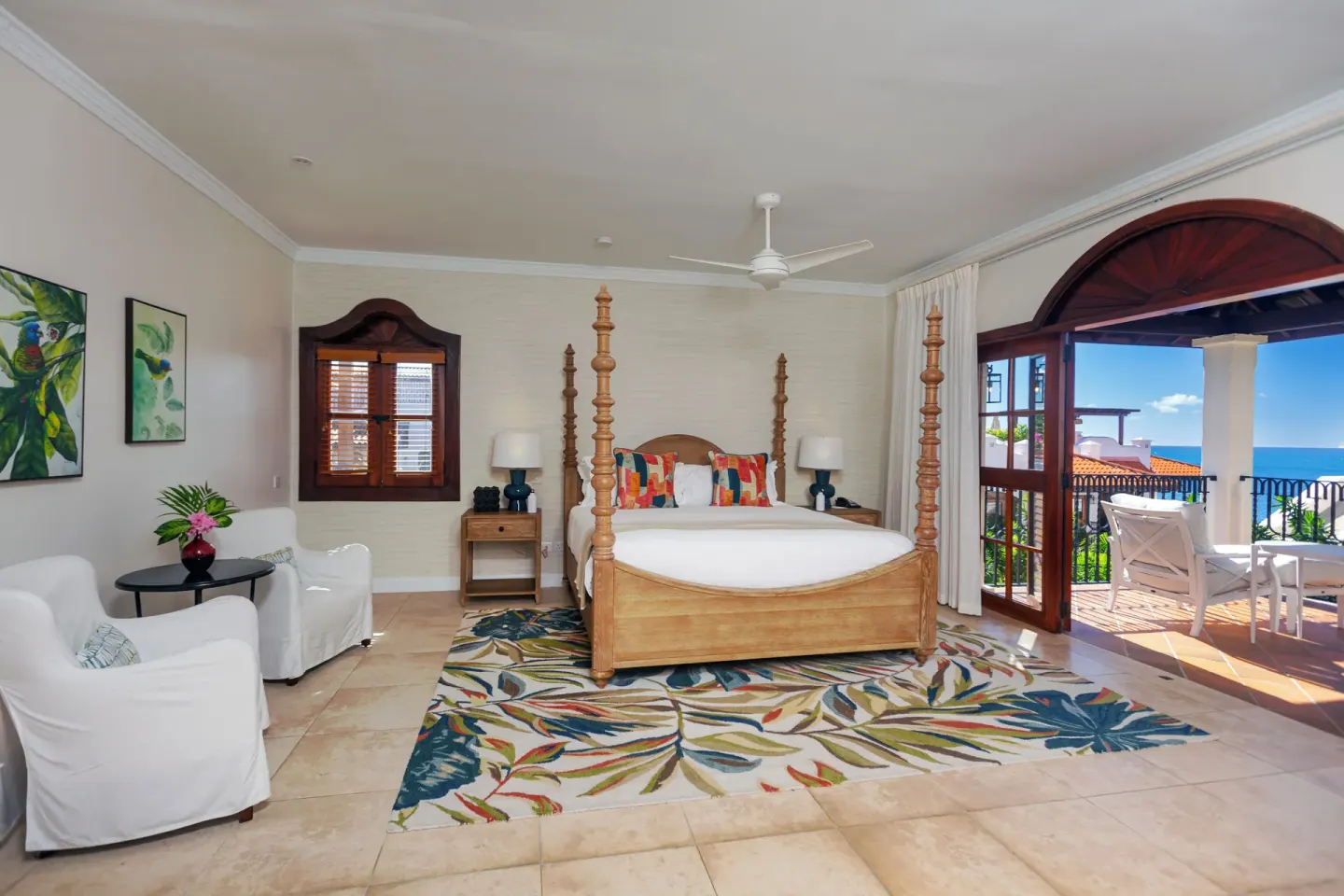 Four-poster bed in an ocean view villa bedroom at Cap Maison Resort & Spa.