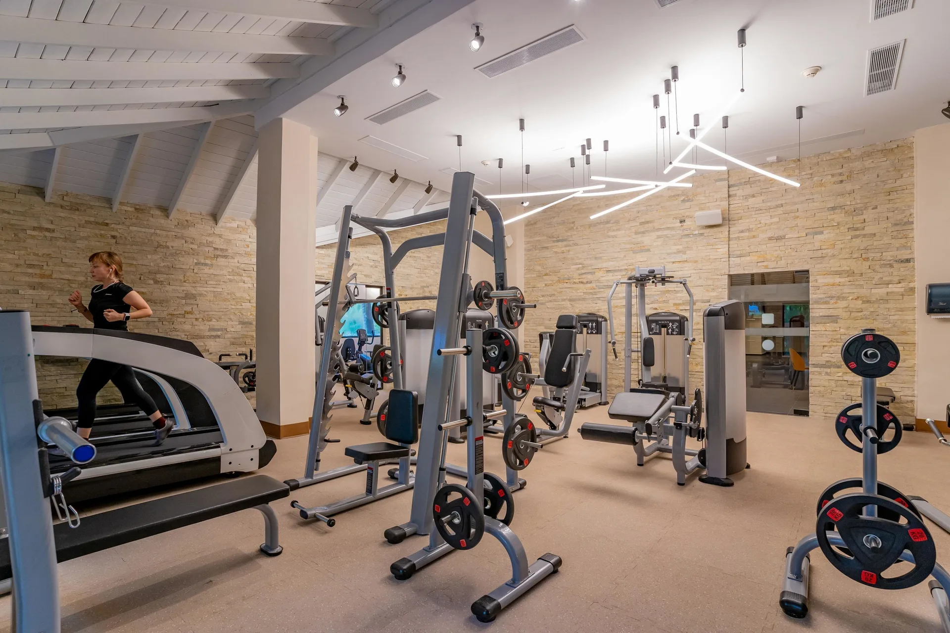 Fitness center with treadmills and weight machines at Caribe Deluxe Princess.