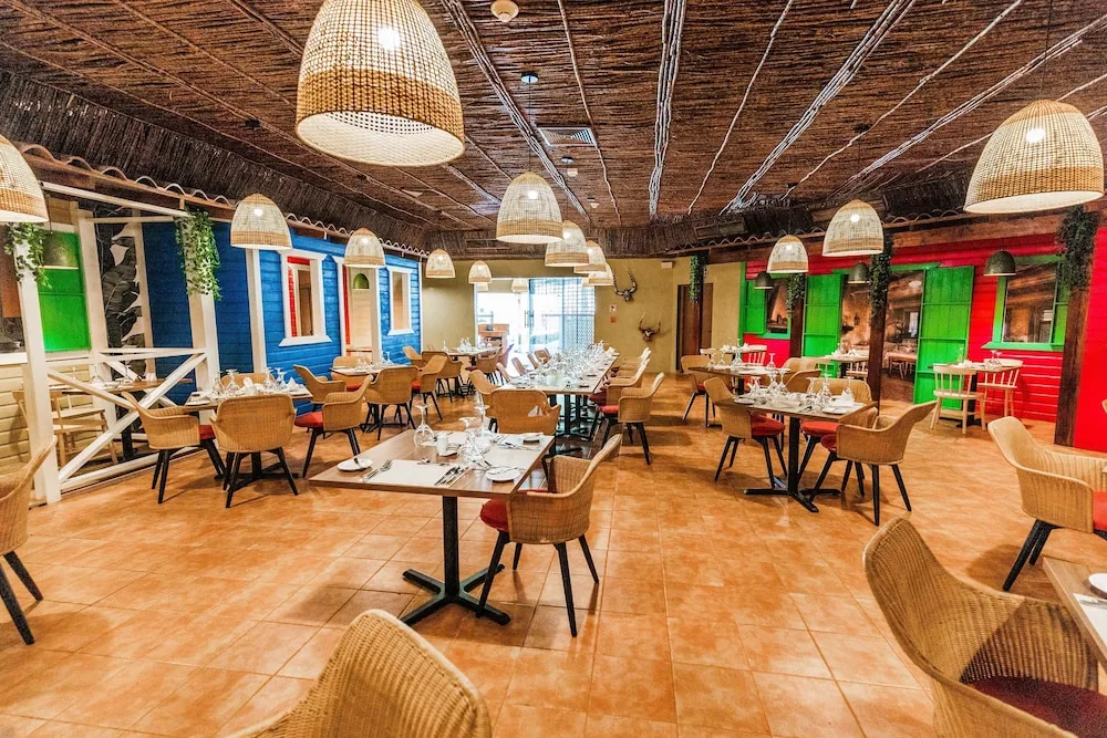 Dominican-style restaurant with colorful façades at Caribe Deluxe Princess.