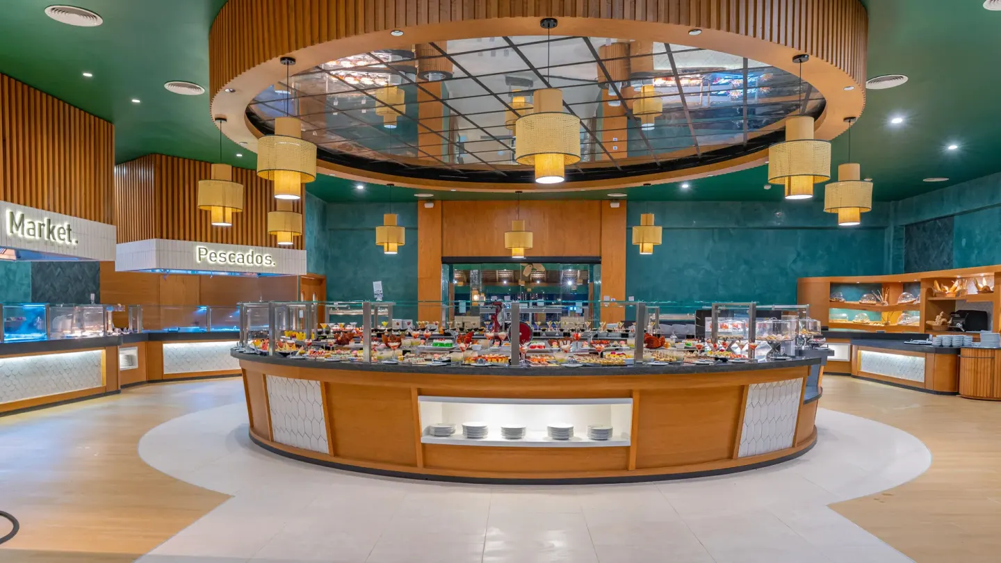 Food Market buffet stations and central island at Caribe Deluxe Princess.