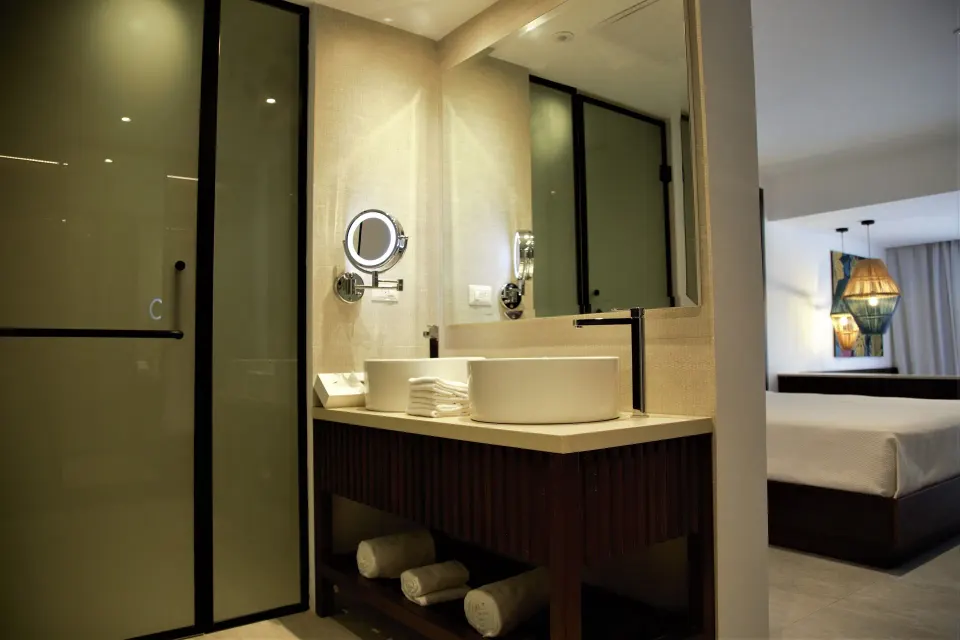 Grand Room bathroom vanity and shower at Caribe Deluxe Princess.