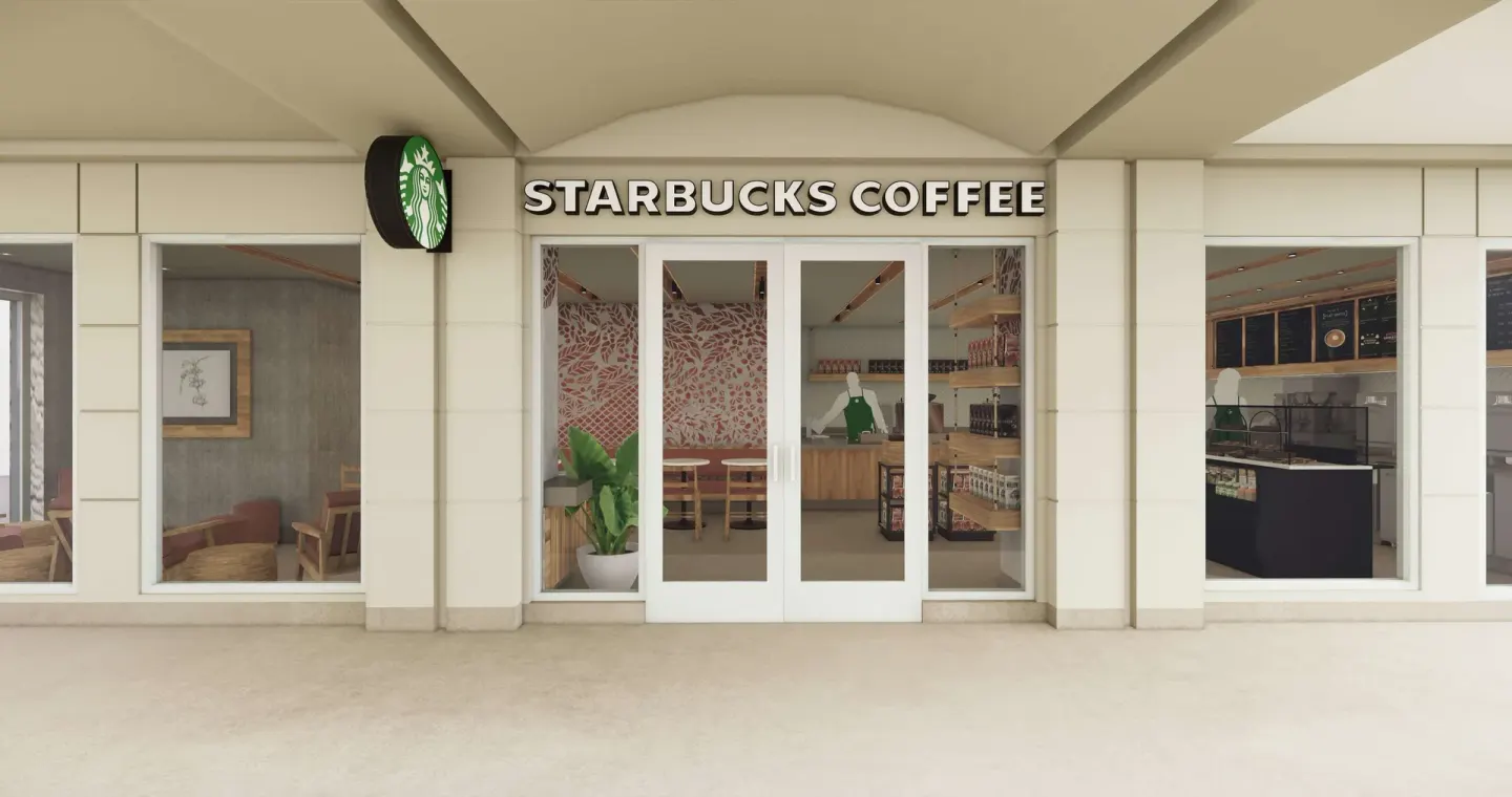 Starbucks Coffee storefront with glass doors and signage at Caribe Hilton.