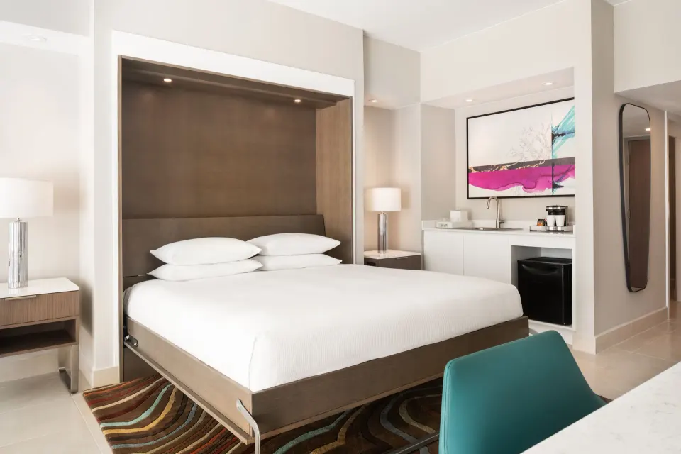 Premium Garden View king guest room with kitchenette at Caribe Hilton.