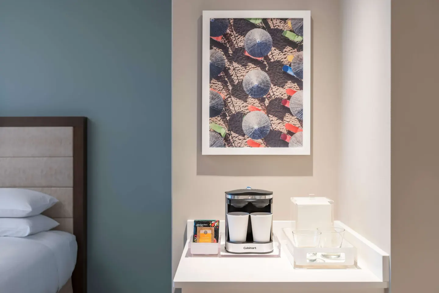Guest room coffee station beside the king bed at Caribe Hilton.