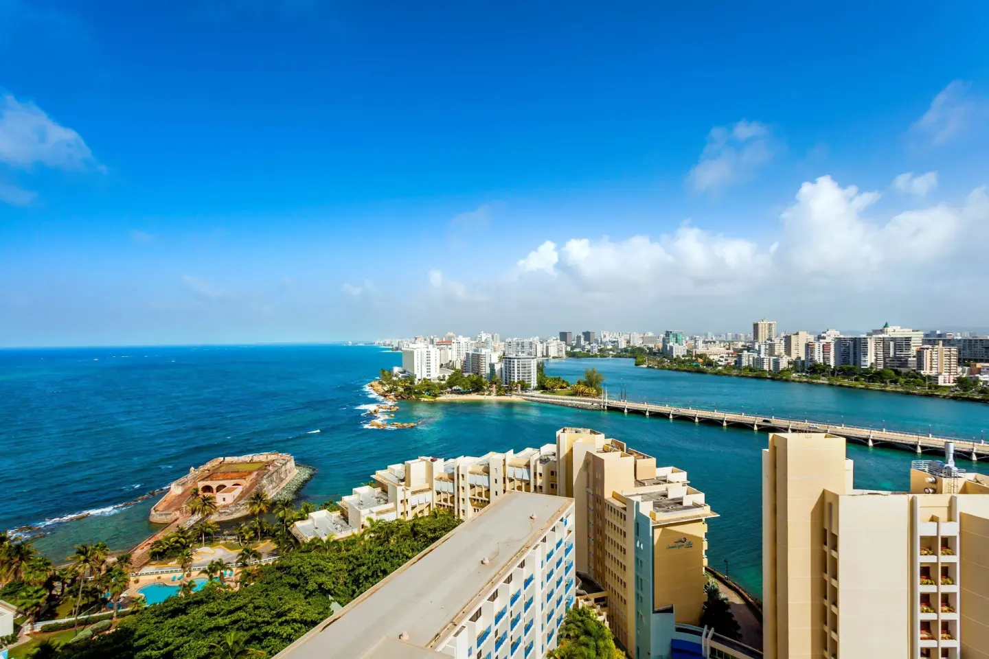 Ocean, lagoon, bridge, and city skyline view from Caribe Hilton.
