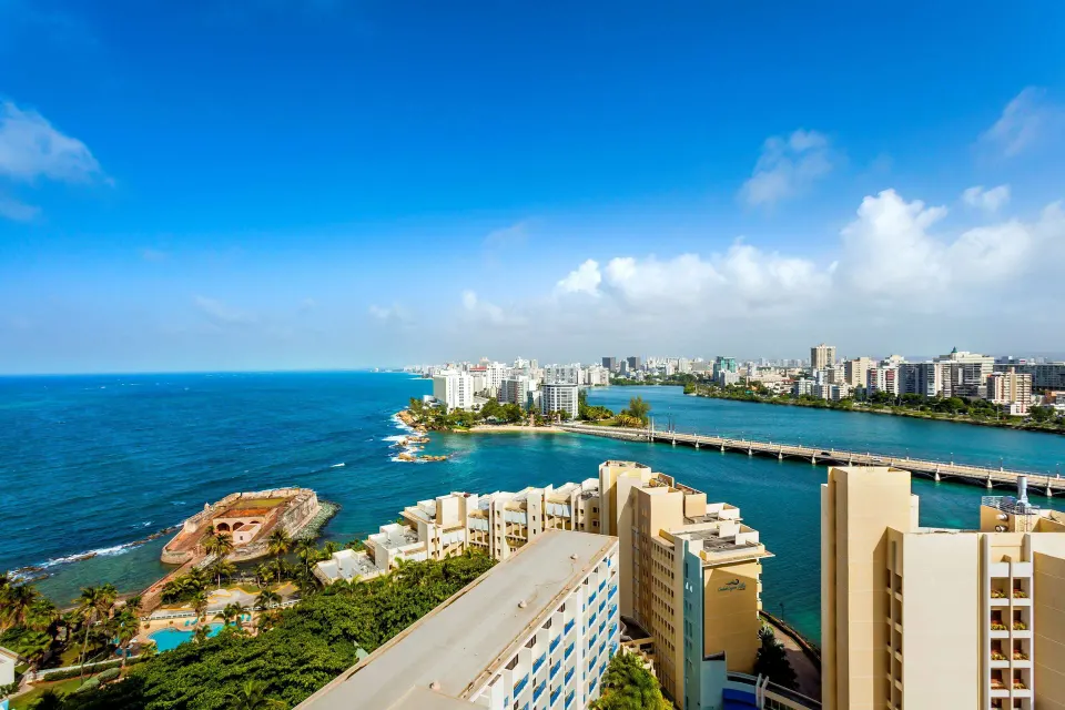 Ocean, lagoon, bridge, and city skyline view from Caribe Hilton.