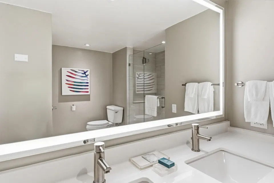 Premium Suite bathroom double vanity and mirror at Caribe Hilton.