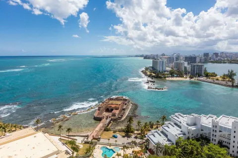 Ocean and San Juan coastline view from the Presidential suite at Caribe Hilton.