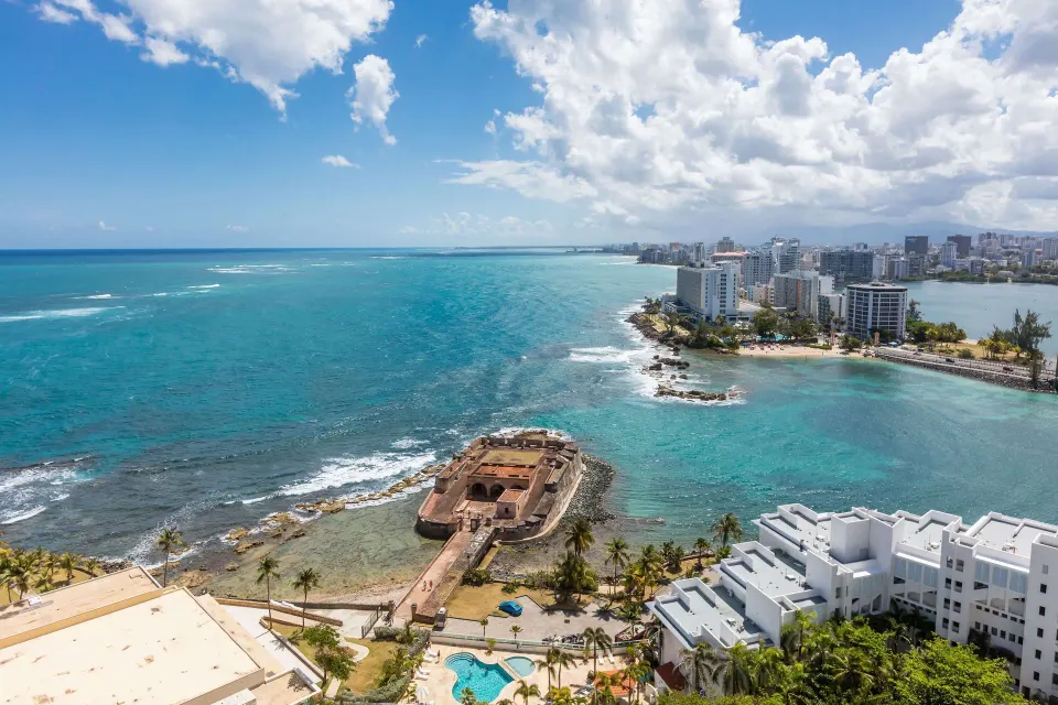 Ocean and San Juan coastline view from the Presidential suite at Caribe Hilton.